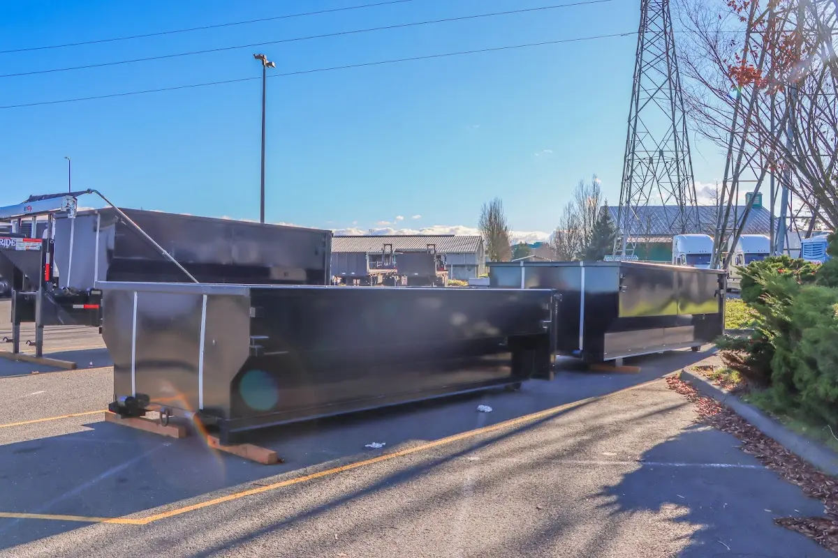 Roll-off dumpster ready for waste disposal at job site for 2 Yard Dumpster Rental in Whitefish Bay